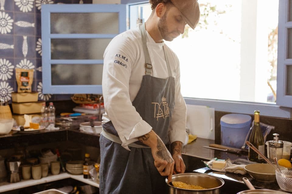 Chef cooking in a professional restaurant kitchen